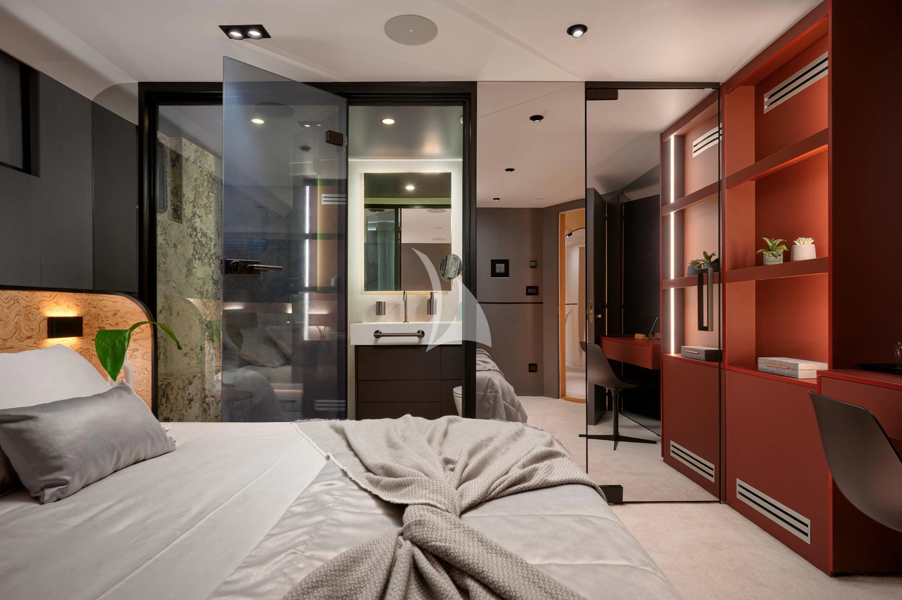 a bedroom with a bed and a desk aboard ANETTA Yacht for Charter