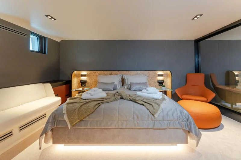 a bed in a room aboard ANETTA Yacht for Charter