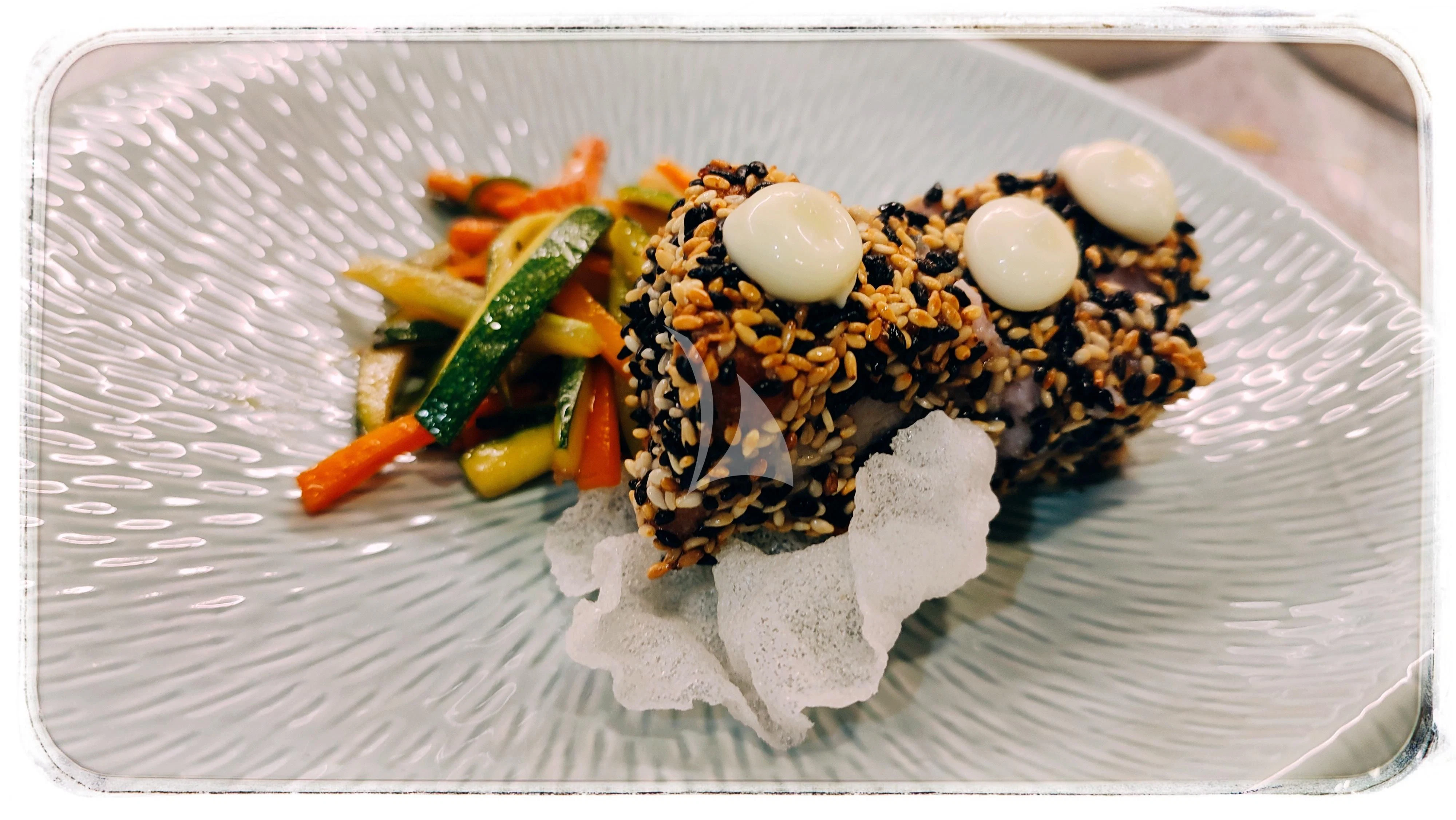 a plate of food aboard ANETTA Yacht for Charter