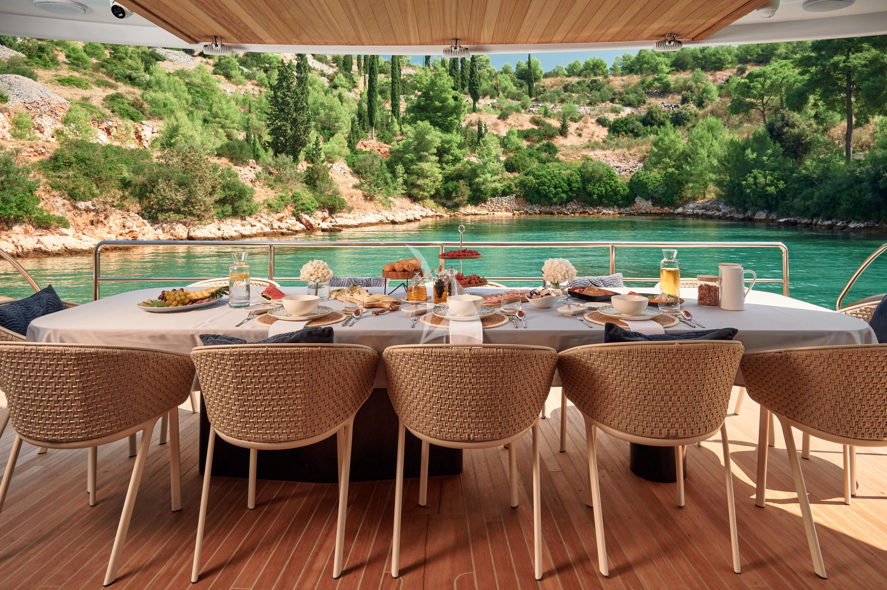 a table set for a meal aboard ANETTA Yacht for Charter