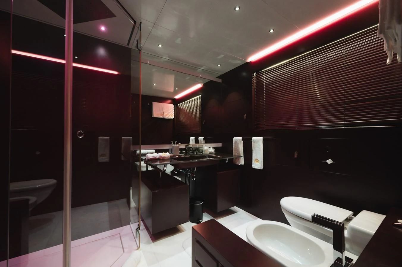 a bathroom with a sink and a mirror aboard MAJESTY ELENOLIYA Yacht for Sale