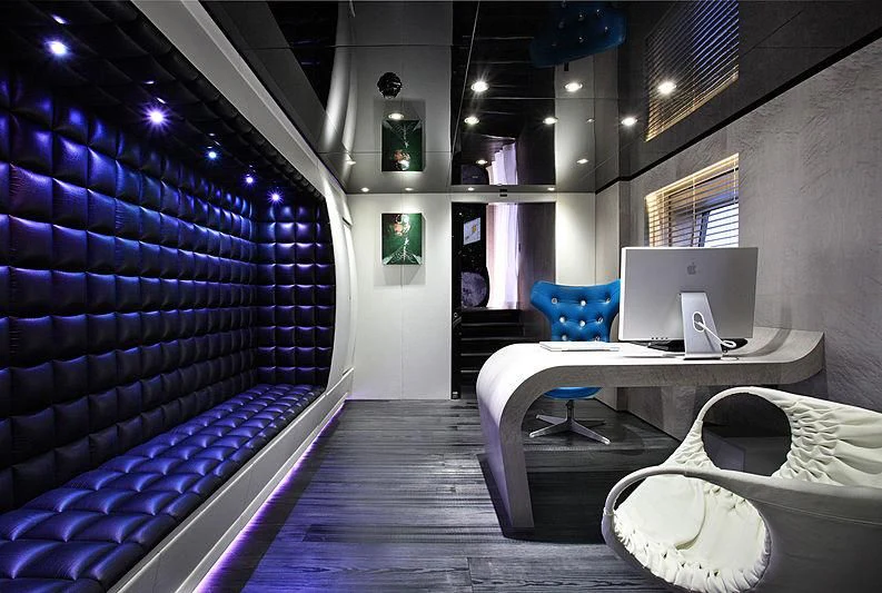 a room with a bed and a computer aboard MAJESTY ELENOLIYA Yacht for Sale