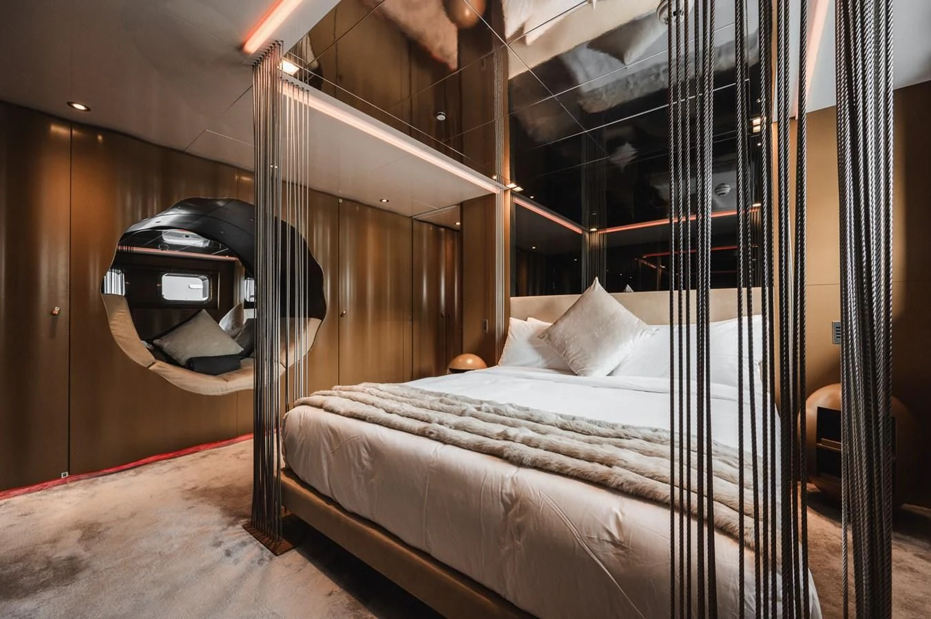a bed in a room aboard MAJESTY ELENOLIYA Yacht for Sale