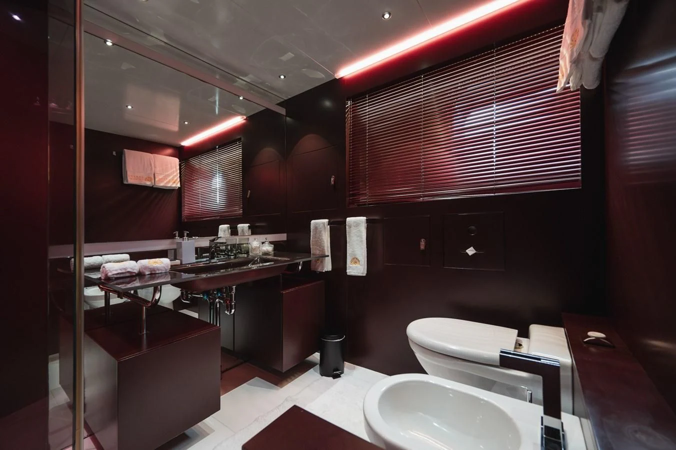 a bathroom with a sink and a toilet aboard MAJESTY ELENOLIYA Yacht for Sale
