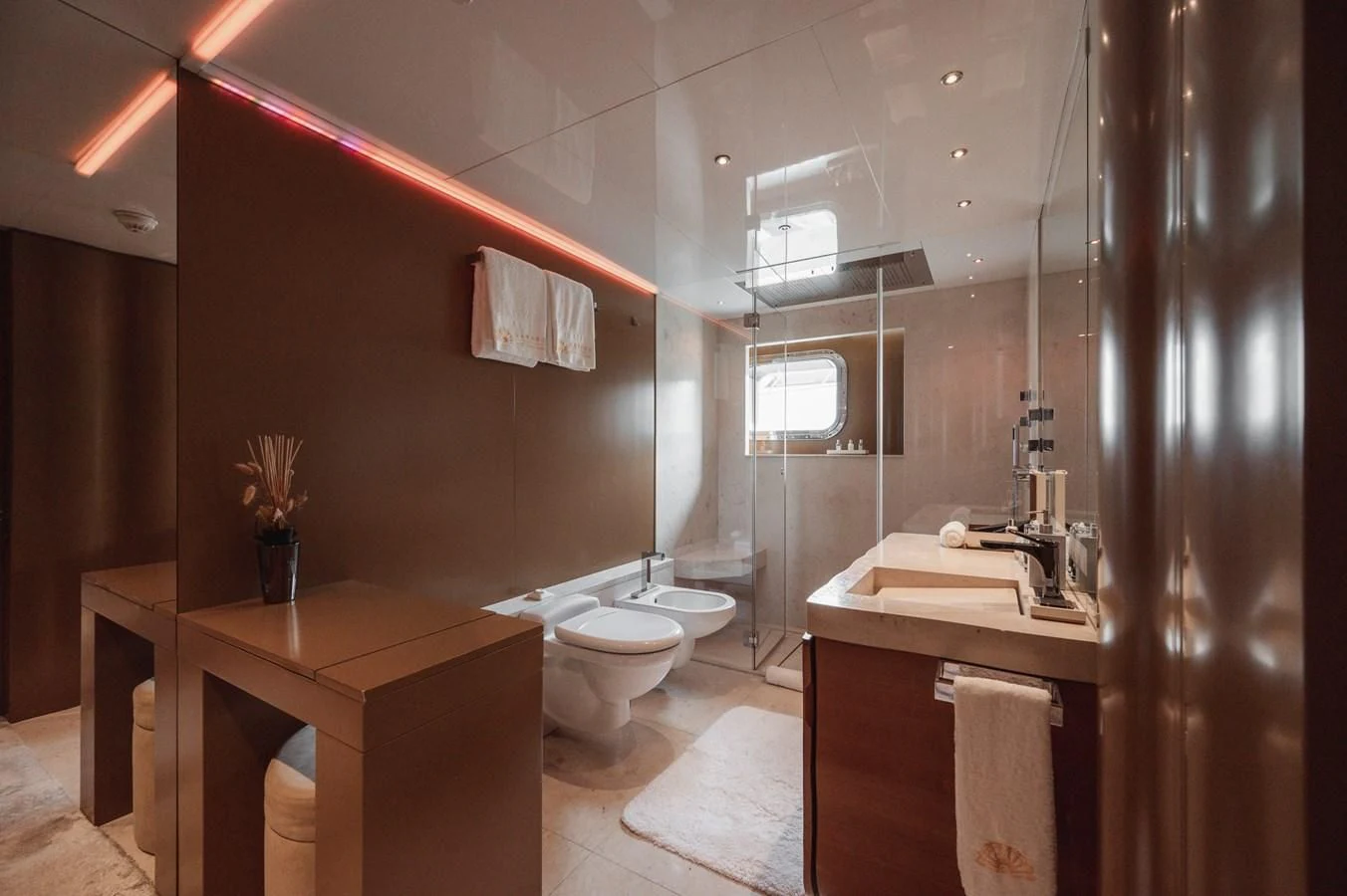 a bathroom with a toilet and sink aboard MAJESTY ELENOLIYA Yacht for Sale