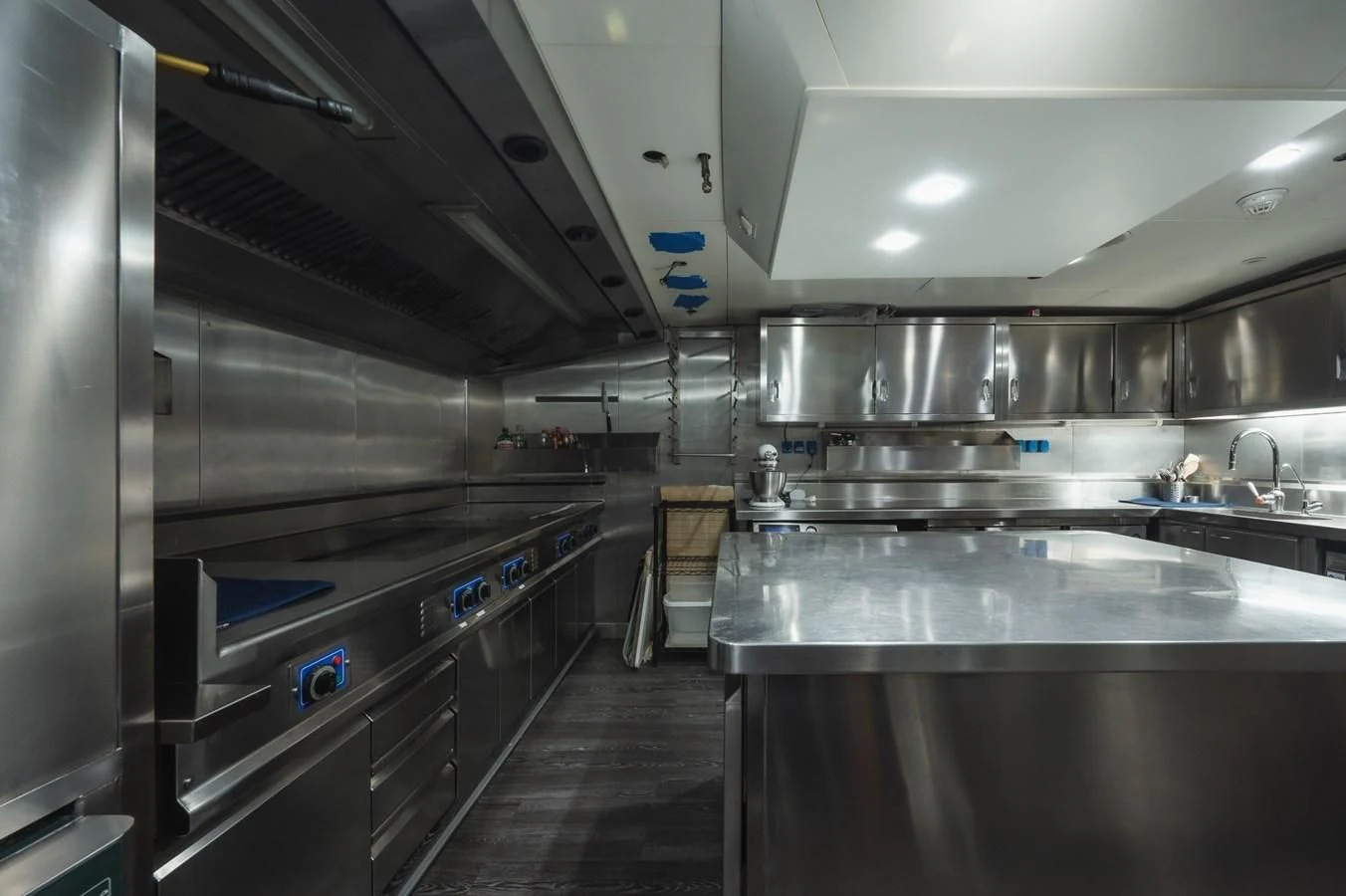 a kitchen with stainless steel appliances aboard MAJESTY ELENOLIYA Yacht for Sale