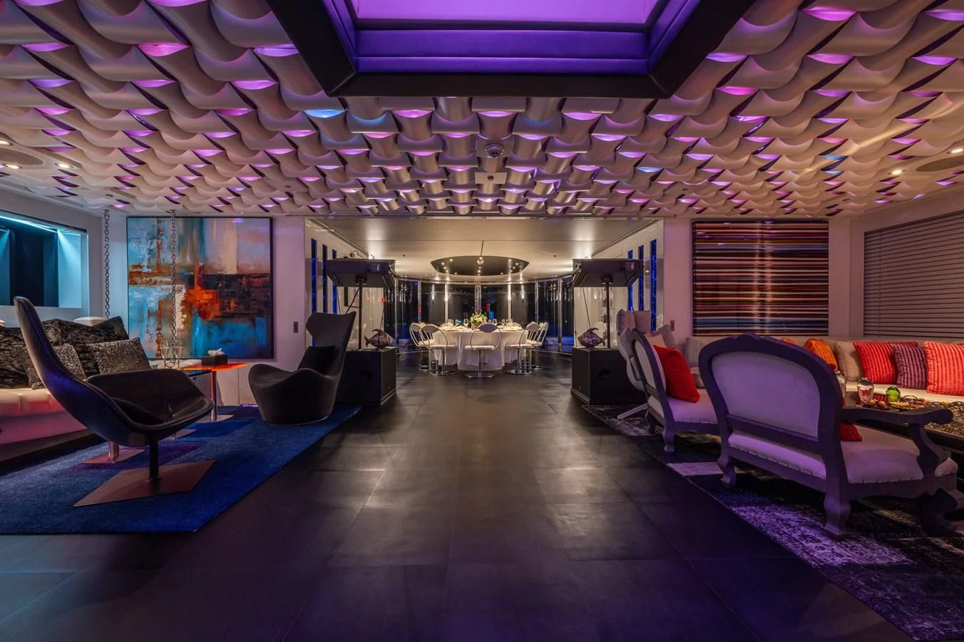 a room with a large screen aboard MAJESTY ELENOLIYA Yacht for Sale