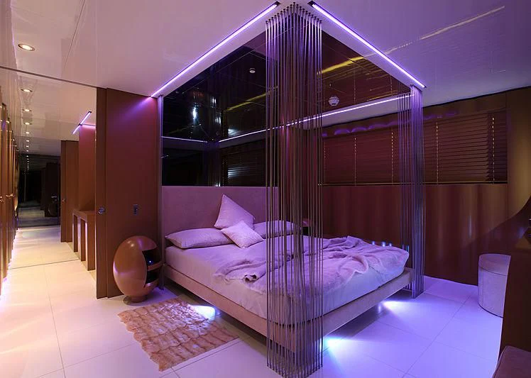 a bed in a room aboard MAJESTY ELENOLIYA Yacht for Sale