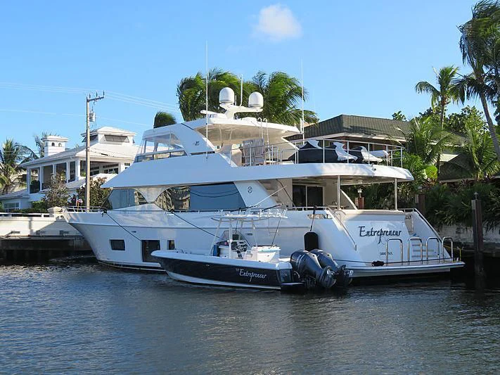a boat docked at a pier aboard FORTISSIMO Yacht for Sale