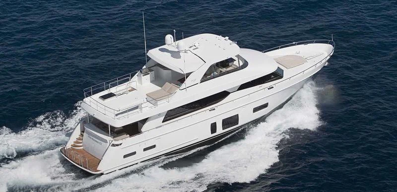 a white yacht on the water aboard FORTISSIMO Yacht for Sale