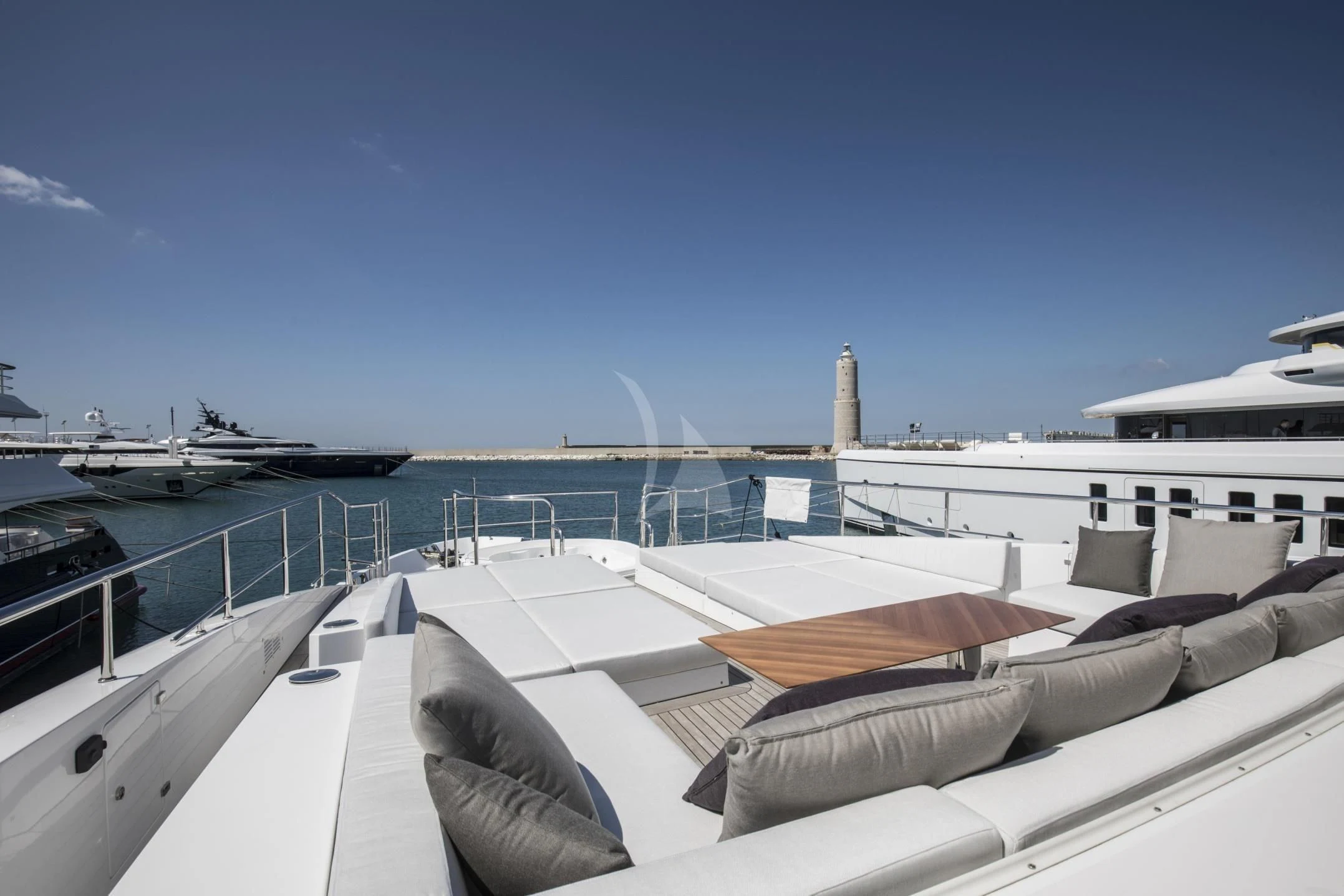 a rooftop of a building with a boat in the water aboard ALEGRE Yacht for Sale