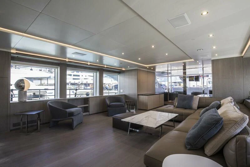 a living room with a large window aboard ALEGRE Yacht for Sale