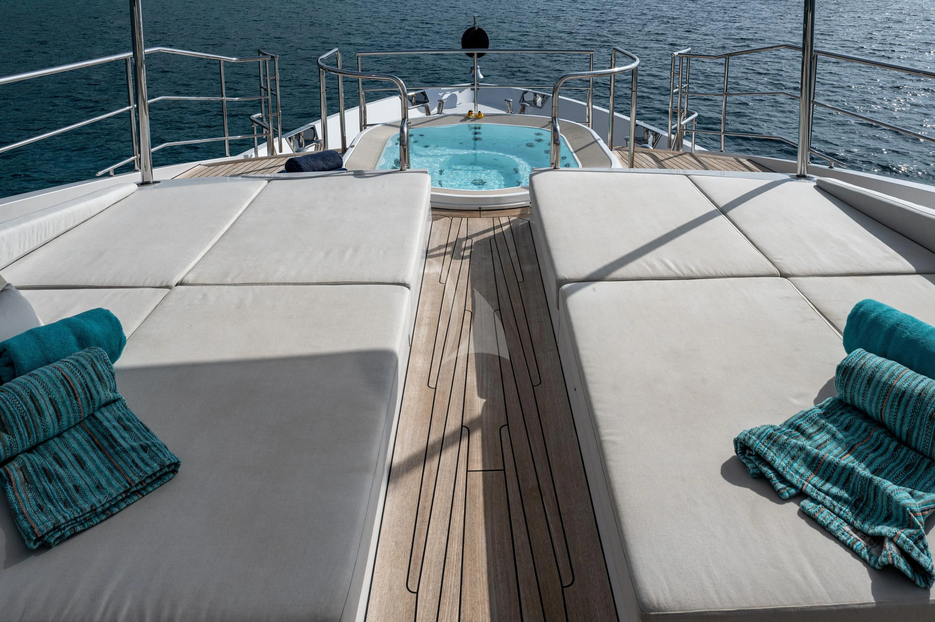 a deck with a pool and a deck aboard ALEGRE Yacht for Sale