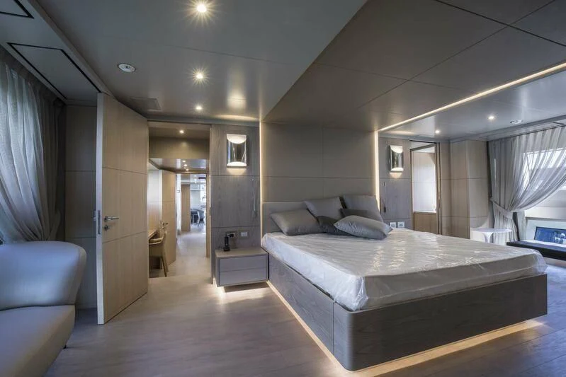 a large bedroom with a bed aboard ALEGRE Yacht for Sale