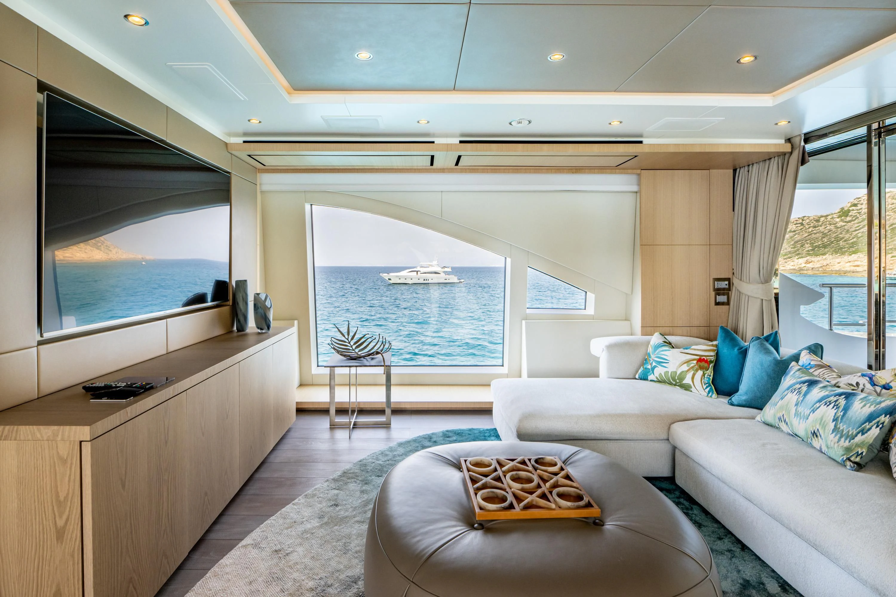 a living room with a large window aboard ALEGRE Yacht for Sale