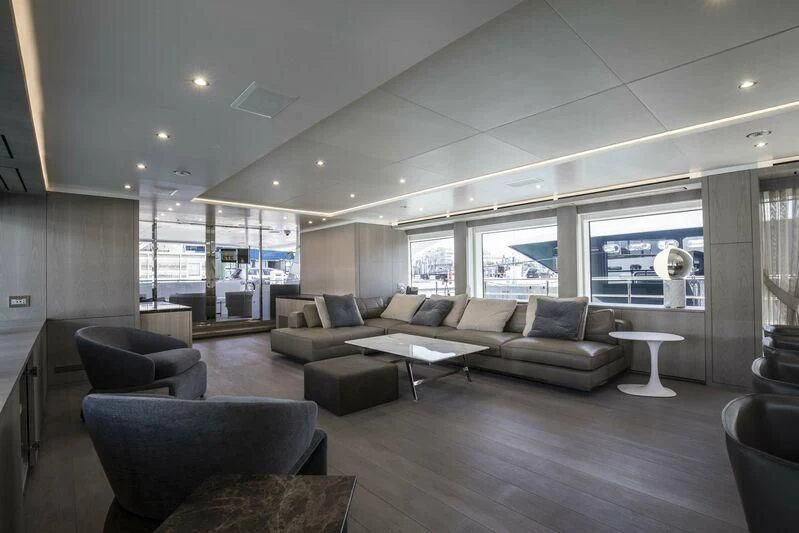 a living room with a large window aboard ALEGRE Yacht for Sale