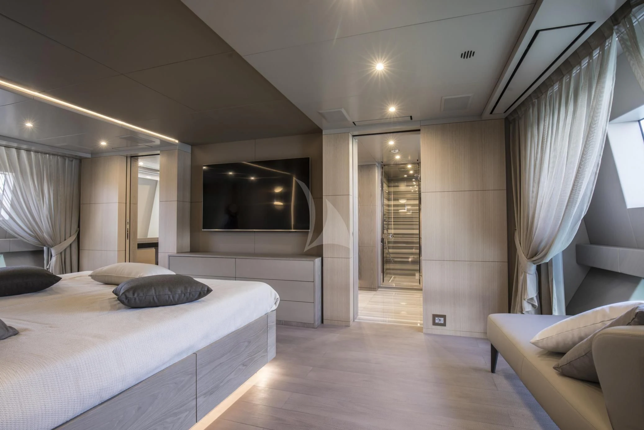 a room with a bed and a television aboard ALEGRE Yacht for Sale
