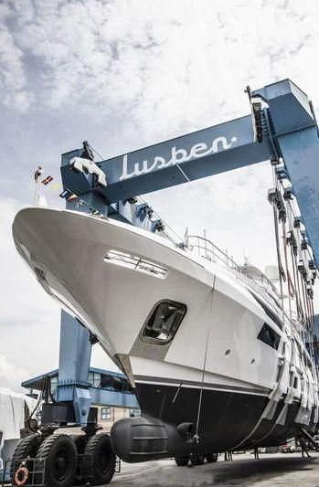 a large white boat with a blue roof aboard ALEGRE Yacht for Sale