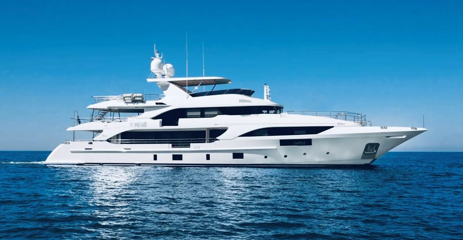 a white yacht on the water aboard ALEGRE Yacht for Sale