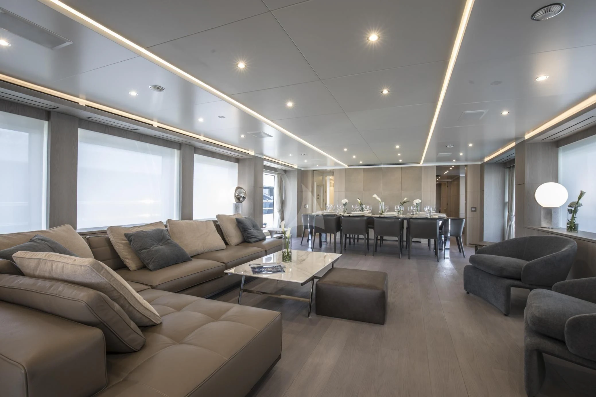 a living room with a large window aboard ALEGRE Yacht for Sale