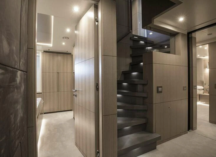 a hallway with a set of stairs aboard ALEGRE Yacht for Sale