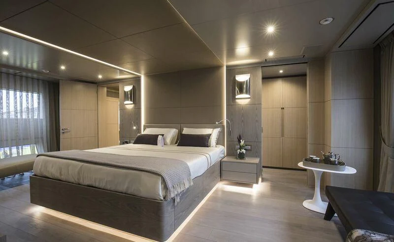 a large bedroom with a bed aboard ALEGRE Yacht for Sale