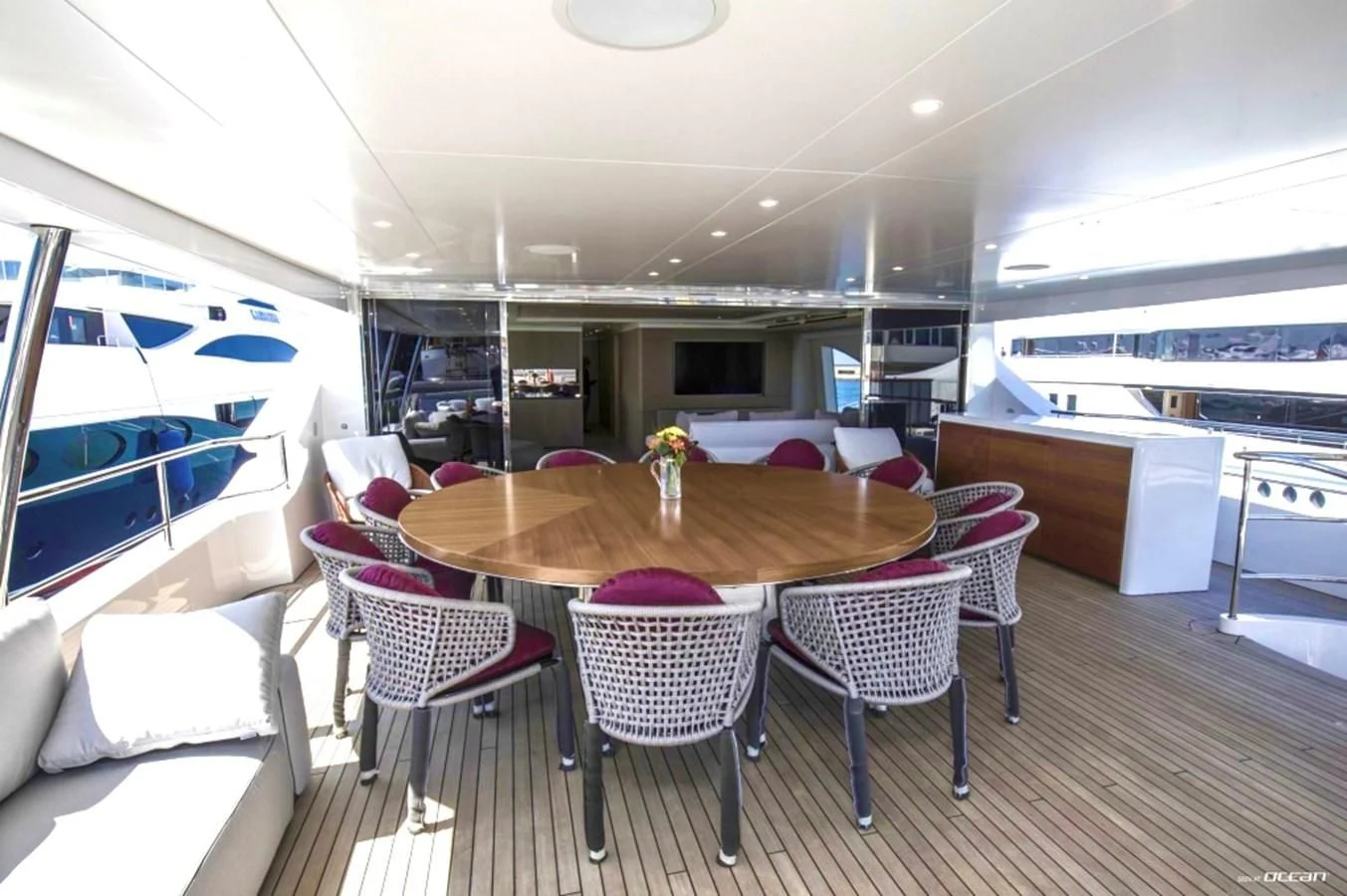 a dining room with a table and chairs aboard ALEGRE Yacht for Sale