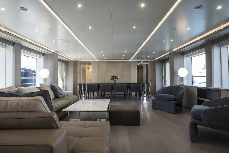 a living room with a couch and a table aboard ALEGRE Yacht for Sale