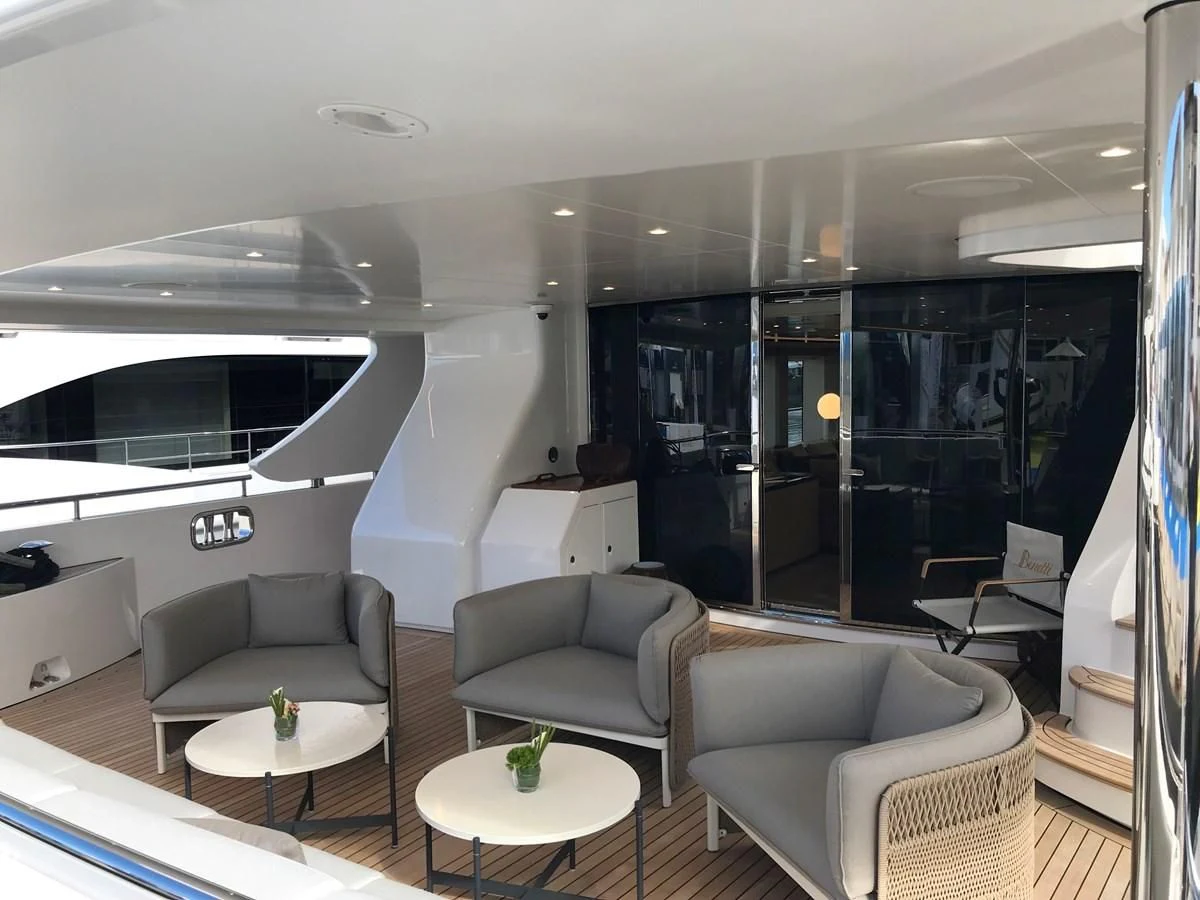 a living room with a large glass door aboard ALEGRE Yacht for Sale
