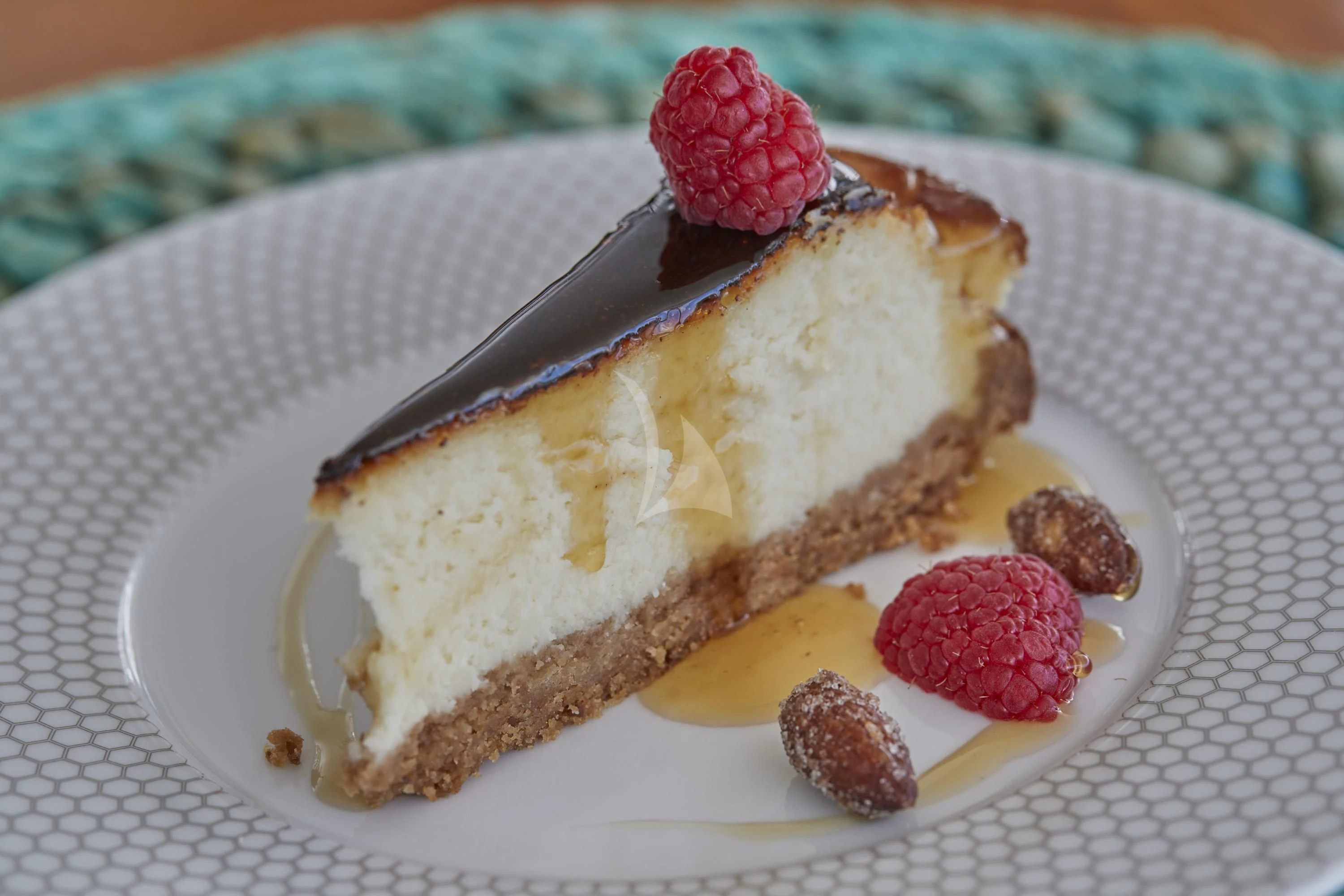 a slice of cake with a strawberry on top aboard ALEGRE Yacht for Sale