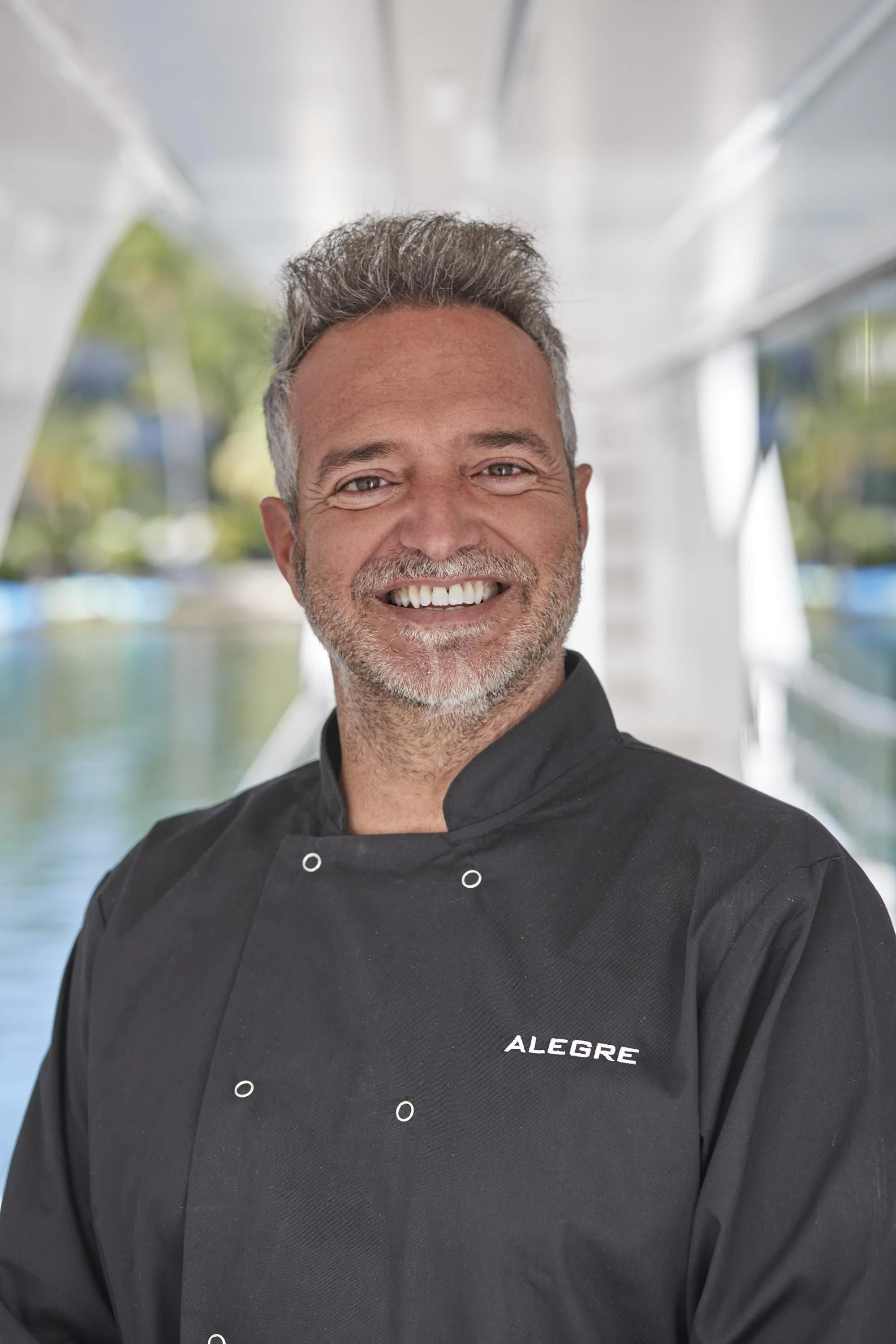 Charlie Higson smiling for the camera aboard ALEGRE Yacht for Sale