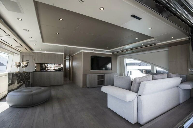 a large living room with a large window aboard ALEGRE Yacht for Sale