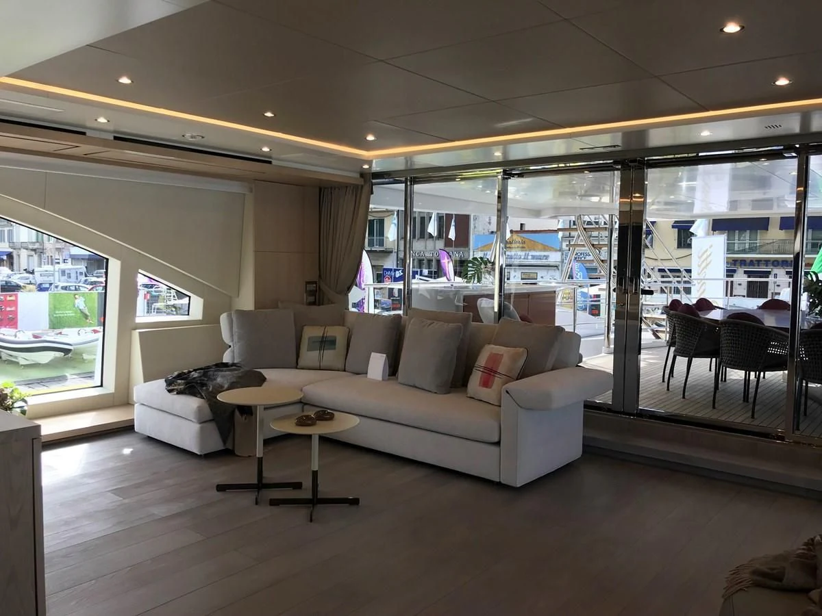 a living room with a large window aboard ALEGRE Yacht for Sale