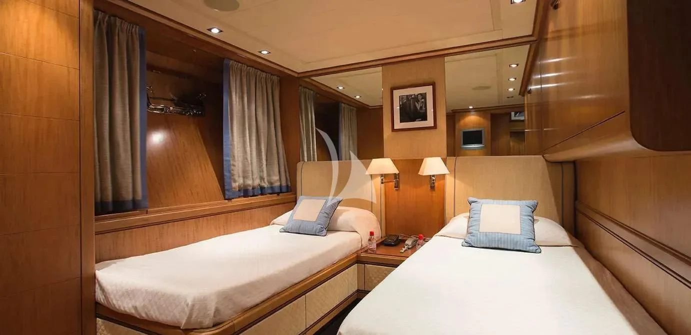 a room with two beds aboard CAPPUCCINO Yacht for Sale