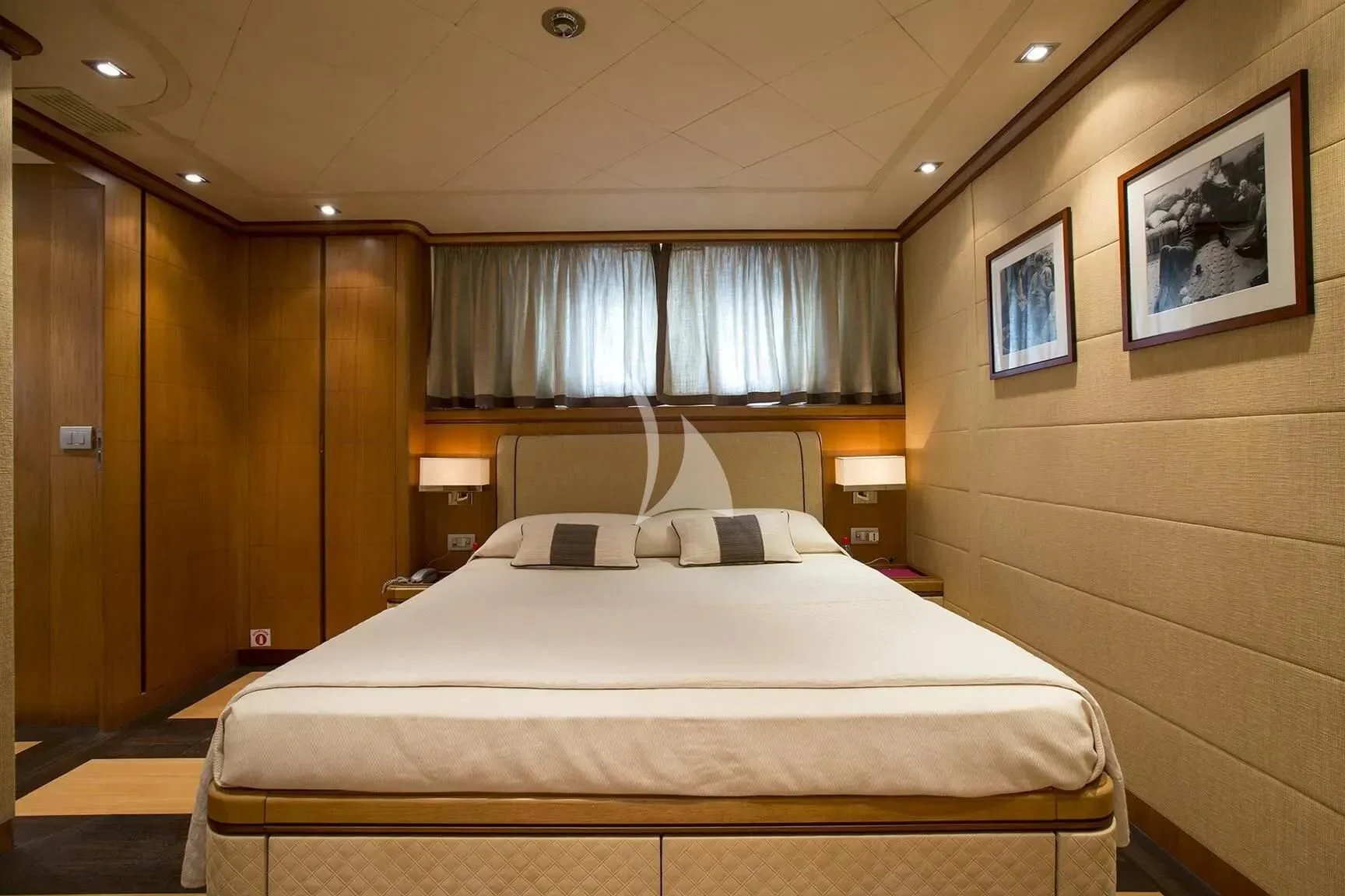 a bed in a hotel room aboard CAPPUCCINO Yacht for Sale