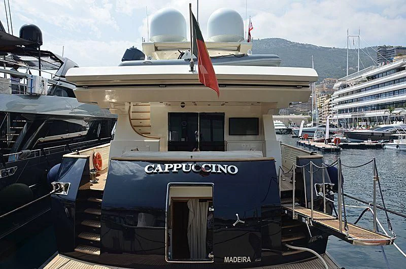 a boat docked at a pier aboard CAPPUCCINO Yacht for Sale