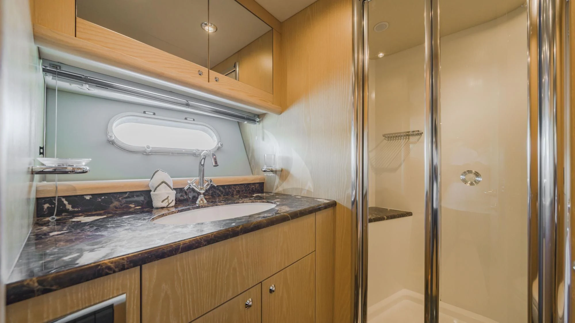a kitchen with a sink and a shower aboard CAPPUCCINO Yacht for Sale