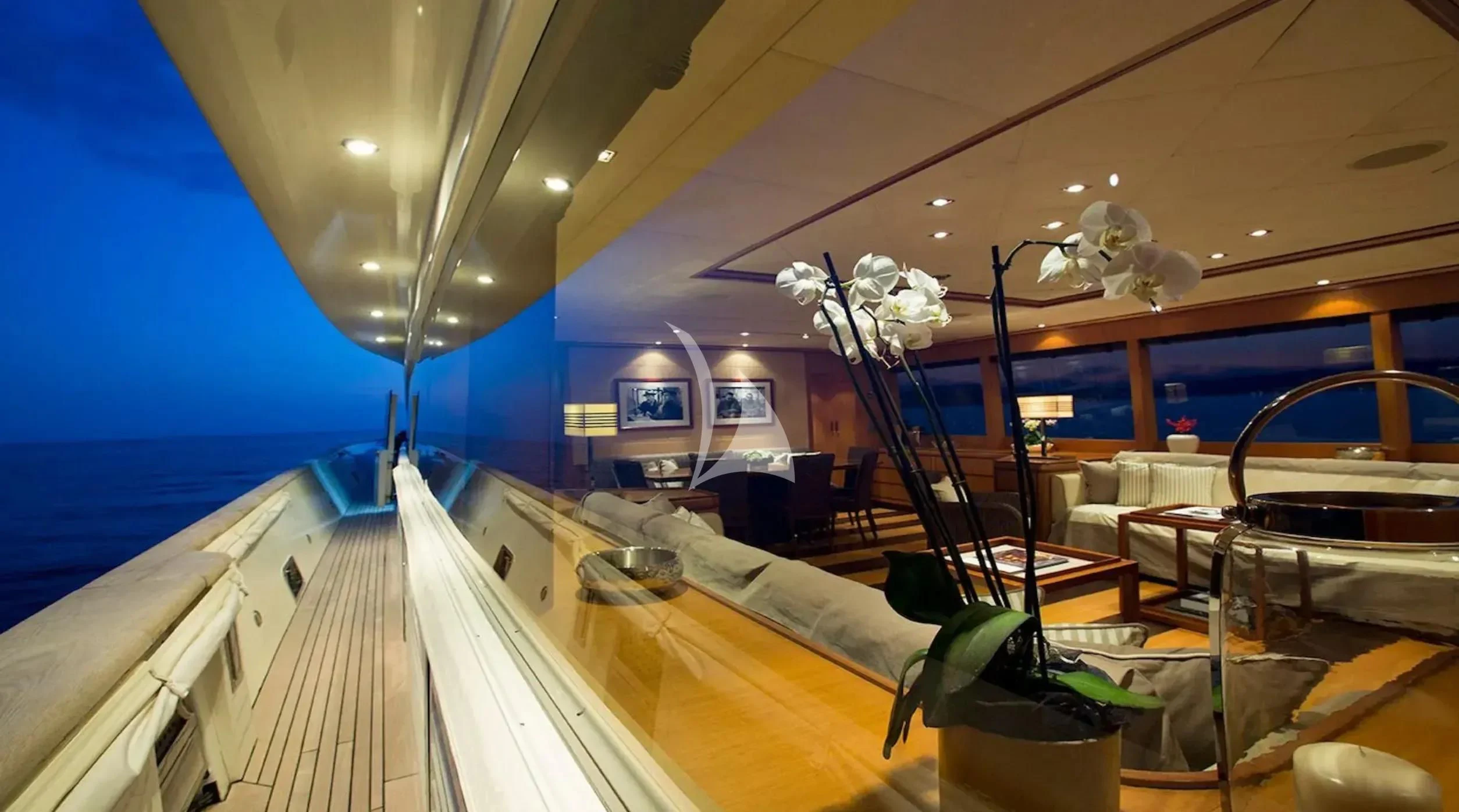 a room with a large window and a view of the ocean aboard CAPPUCCINO Yacht for Sale