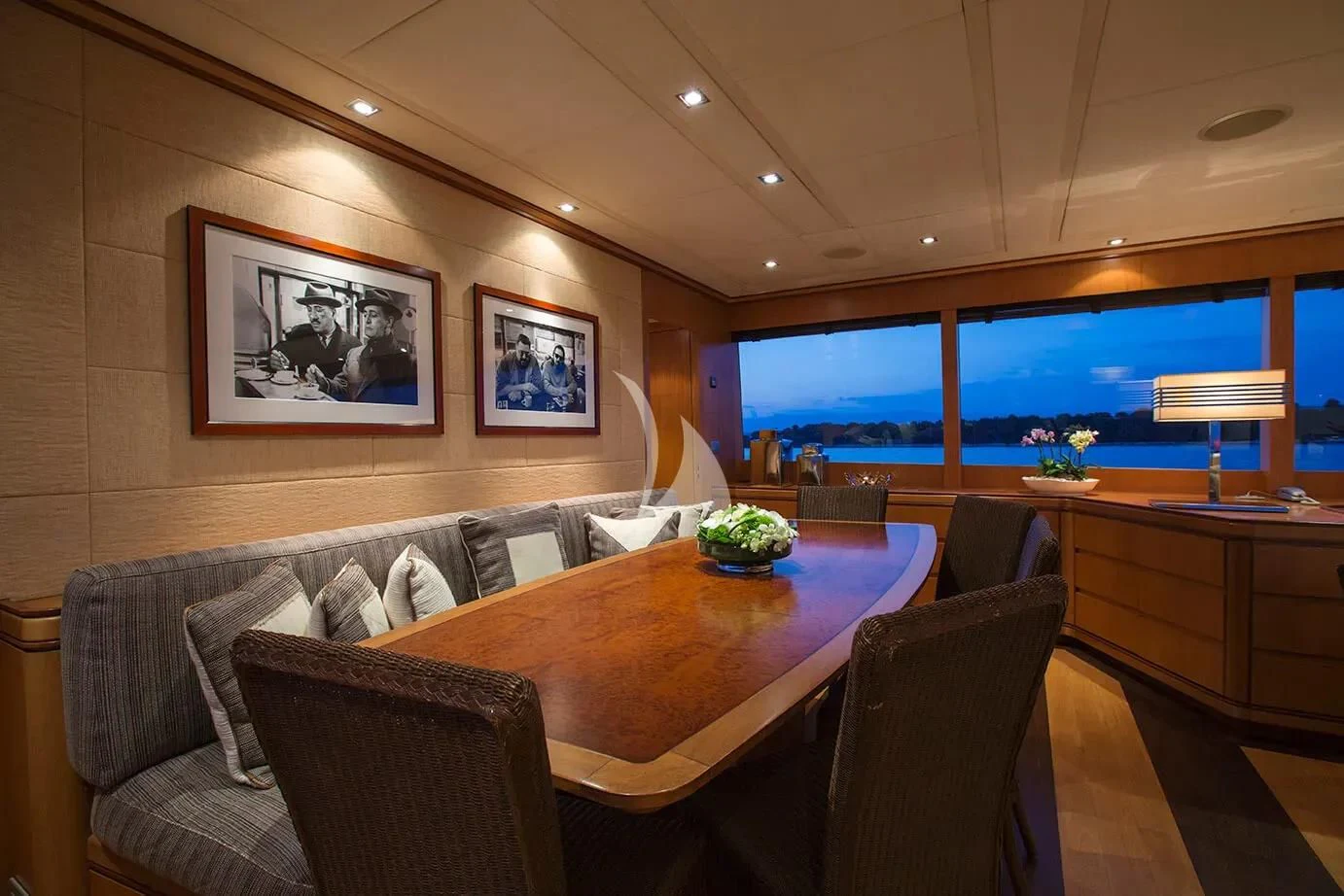 a room with a couch and a table and a tv aboard CAPPUCCINO Yacht for Sale