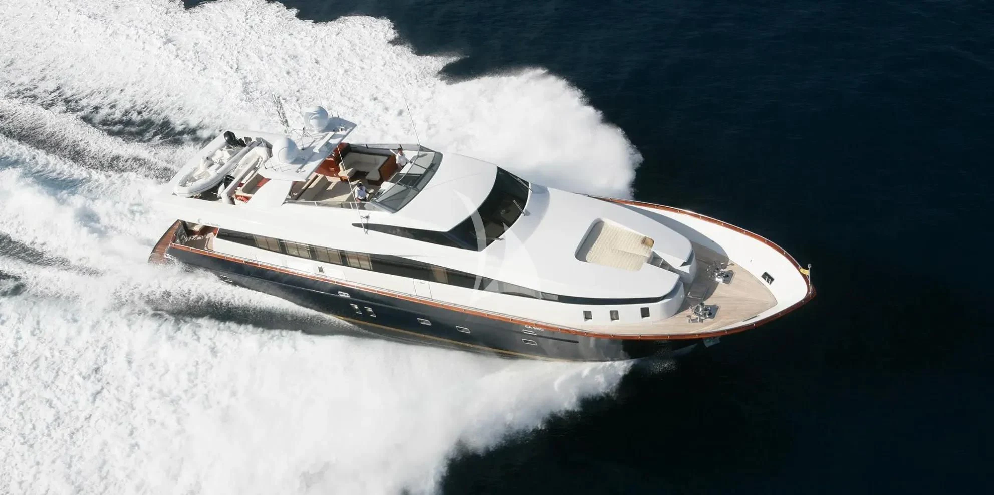 a white boat on a body of water aboard CAPPUCCINO Yacht for Sale