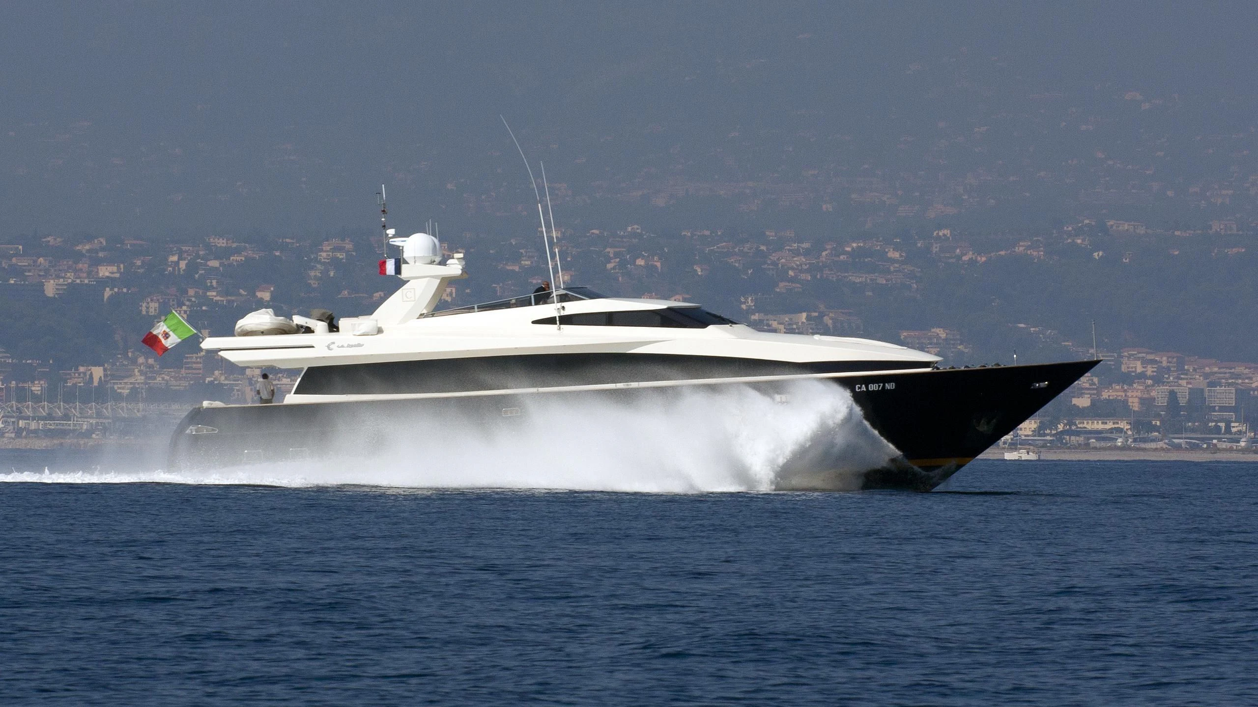 a large ship in the water aboard CAPPUCCINO Yacht for Sale