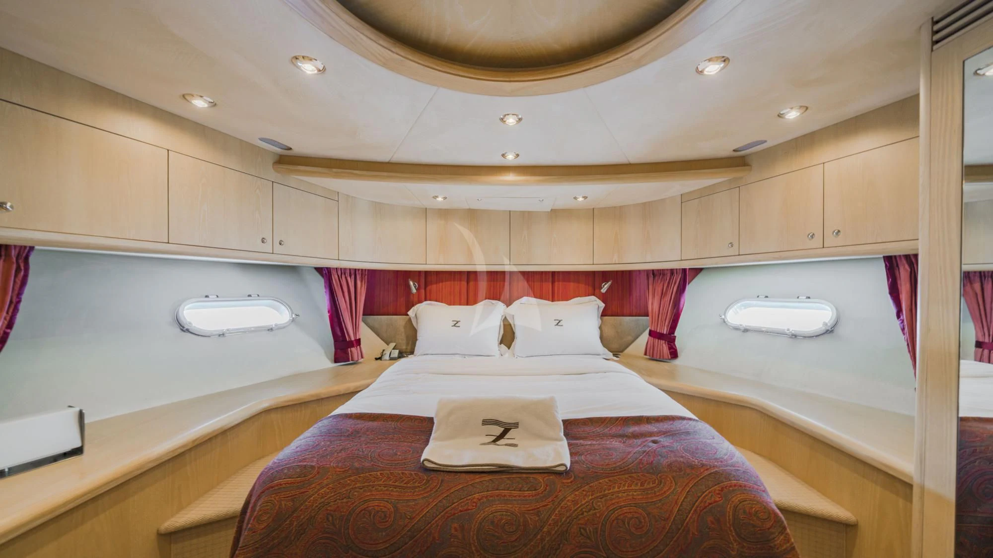 a bed in a room aboard CAPPUCCINO Yacht for Sale