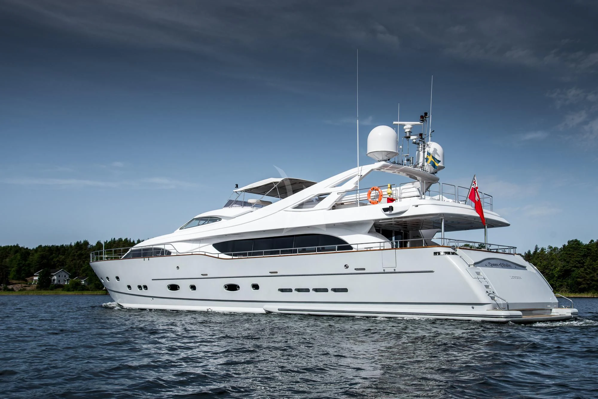 a white yacht on the water aboard QUEEN OF SHEBA Yacht for Sale