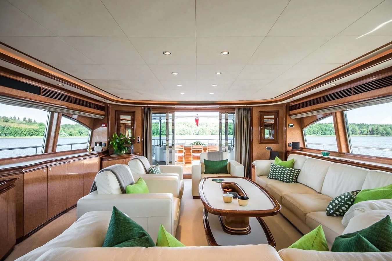a living room with a couch and a table aboard QUEEN OF SHEBA Yacht for Sale