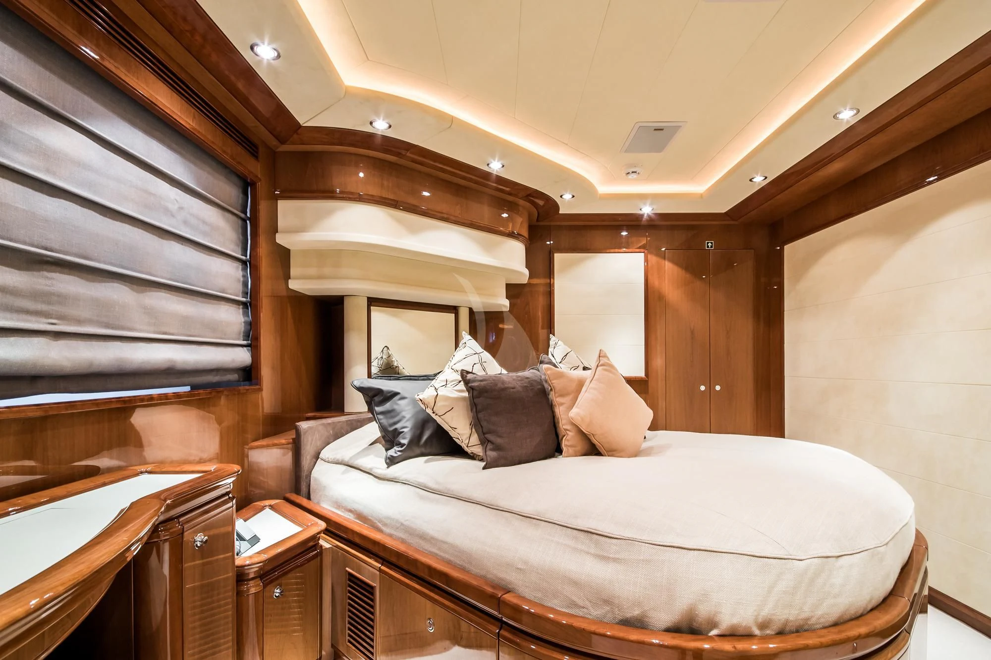 a bed with pillows aboard QUEEN OF SHEBA Yacht for Sale