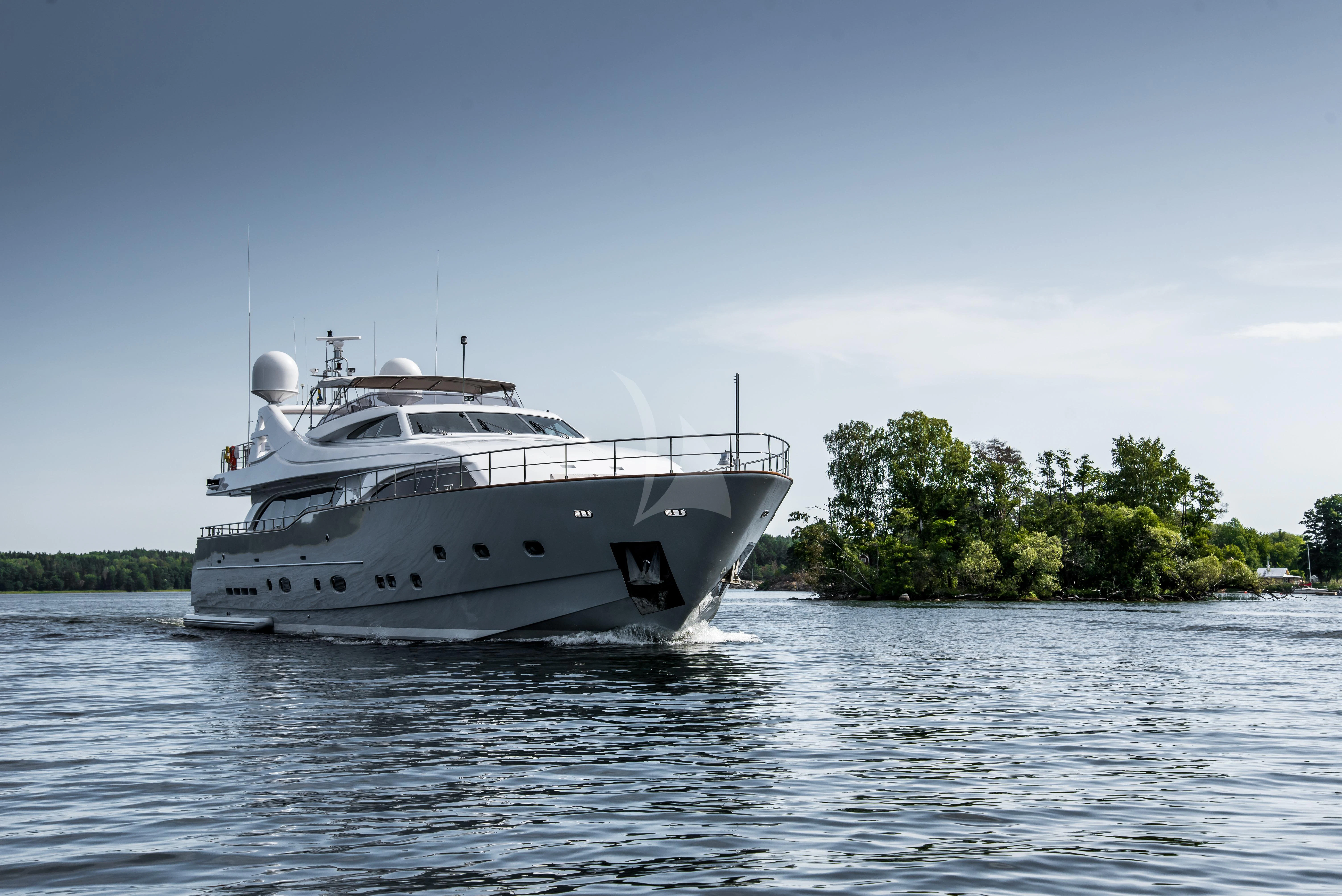 a white yacht on the water aboard QUEEN OF SHEBA Yacht for Sale