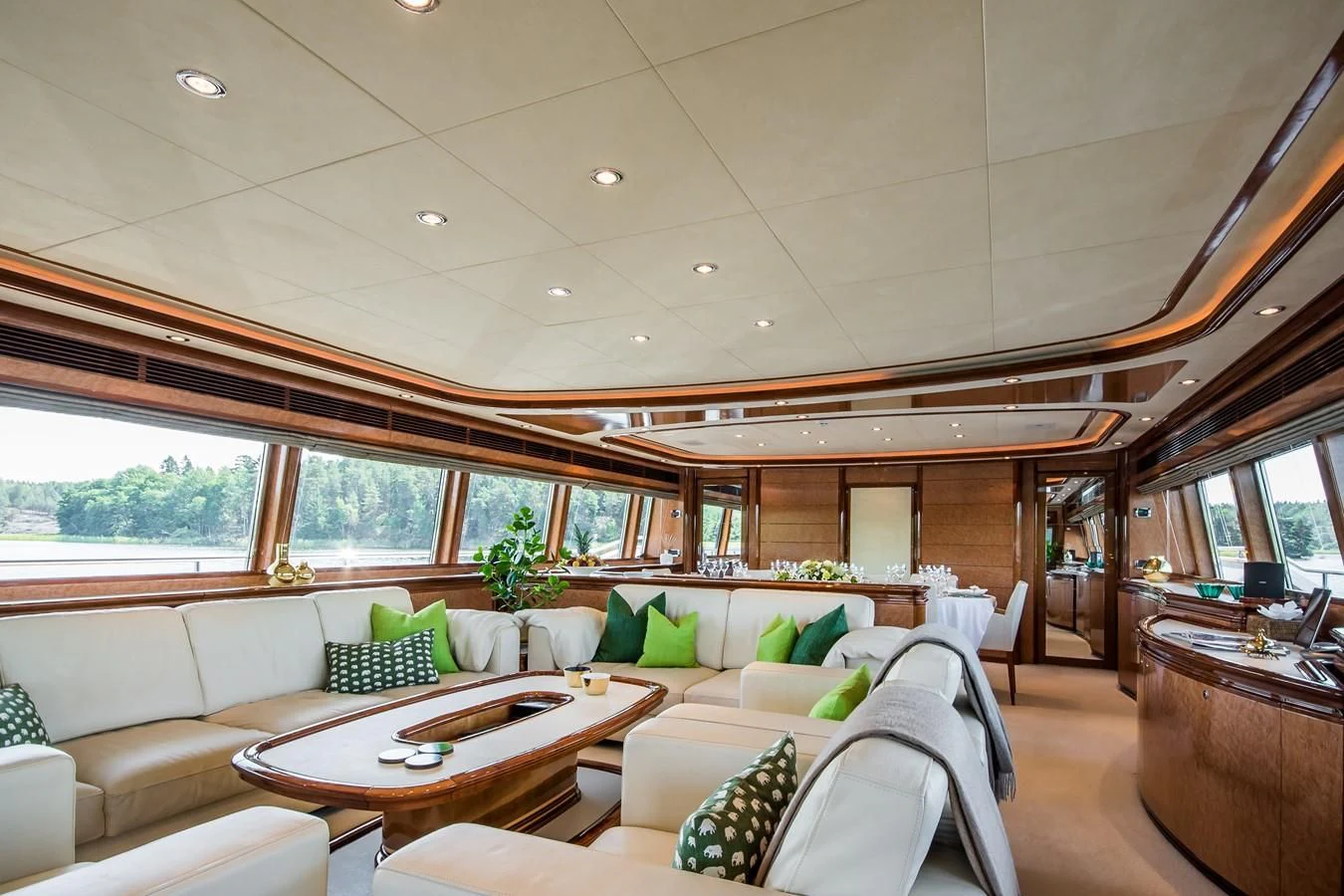a living room with a couch and a table aboard QUEEN OF SHEBA Yacht for Sale