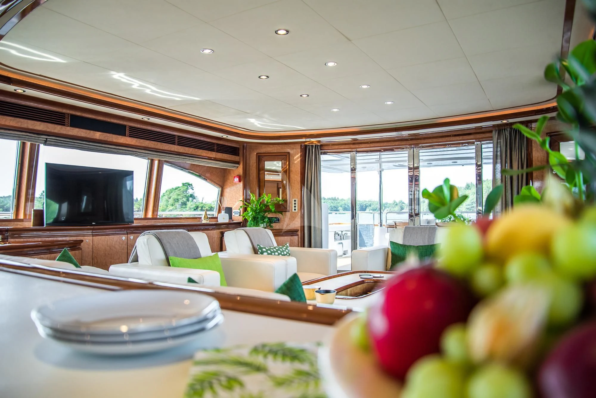 a room with tables and chairs aboard QUEEN OF SHEBA Yacht for Sale
