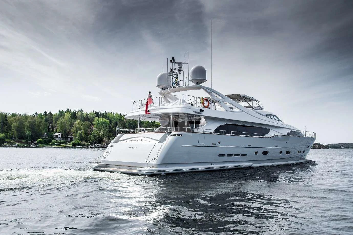 a large white boat on the water aboard QUEEN OF SHEBA Yacht for Sale