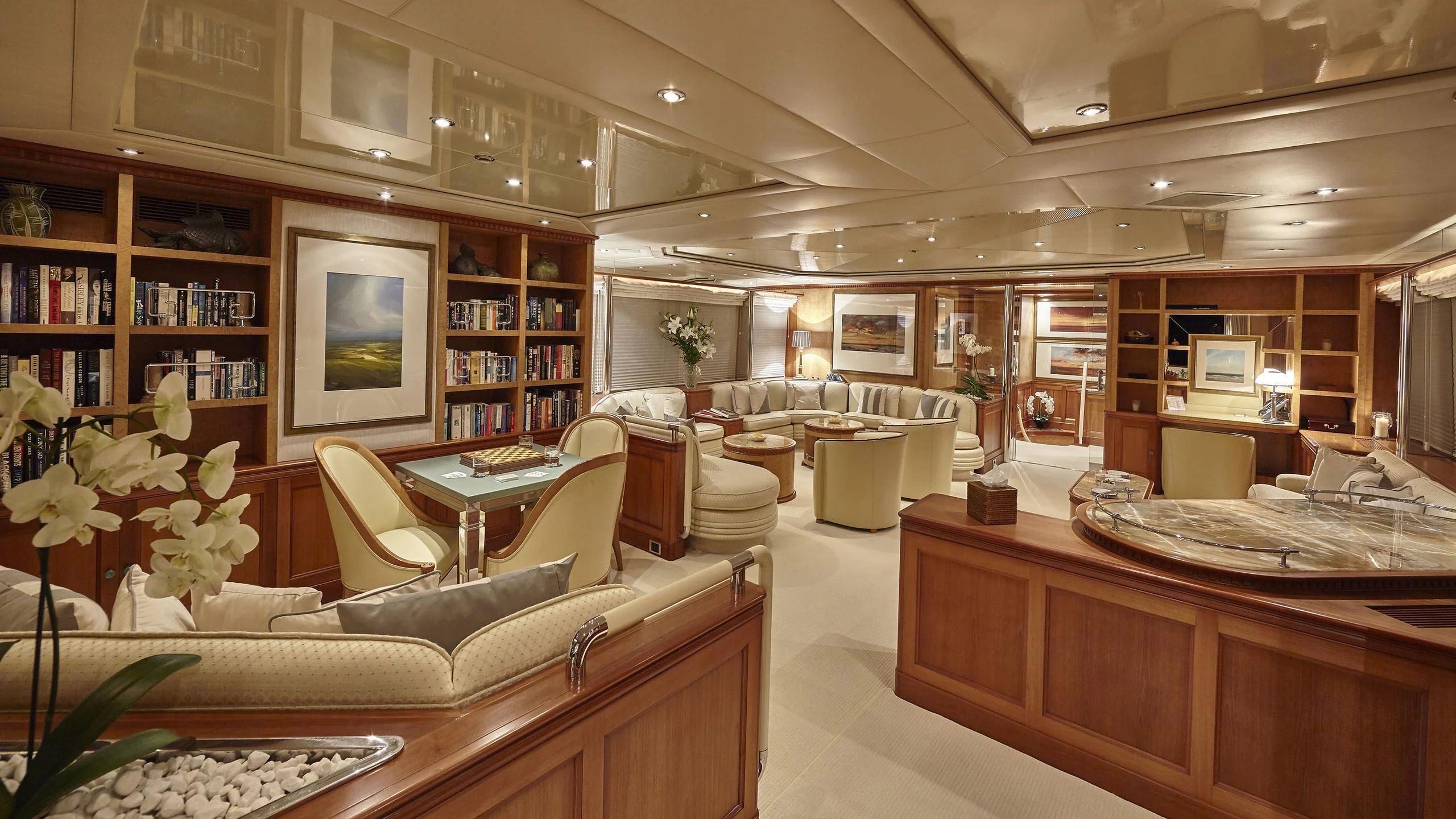 a room with a couch and a table aboard AZUL V Yacht for Charter